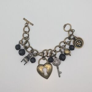 Alice and Wonderland Brass Charm Toggle bracelet